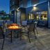 Fairfield by Marriott Inn & Suites Aberdeen, SD patio with fire pit and outdoor seating at night