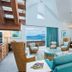 Cane Garden Bay Beach Hotel in Leonards with airy lounge, ocean view and balcony seating