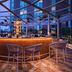 Aloft Bengaluru Outer Ring Road rooftop bar with circular counter and city views in Bengaluru