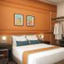 Kuala Lumpur International Hotel in Kuala Lumpur, guest room with king bed, bedside lamps and open wardrobe