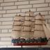 Elbbrücken Hotel Hamburg lobby display of a detailed sailing ship model against a brick wall