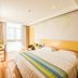 Greentree Inn Ningguo Ningguo Avenue Chengxin Building room with bed, TV, window and chair in Xuancheng