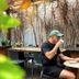 San Diego Suites Pampulha Hotel - Oficial in Belo Horizonte: guest seated at an outdoor dining table