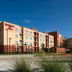 Residence Inn by Marriott Dallas Plano/The Colony exterior with modern low-rise building and clear blue sky