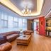 Shengshi Civil Aviation Hotel, Zhengzhou lounge with leather sofas, wood coffee table, red walls and chandelier