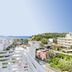 Balcony sea view at allsun Hotel Paguera Vera Beach in Peguera, overlooking rooftops and the coast.