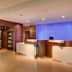 Fairfield Inn & Suites by Marriott Calhoun lobby with front desk and market area