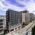 Garner Hotel Kyoto Shijo Karasuma By IHG exterior on a Kyoto city street with buildings and road