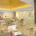 Chisun Hotel Koriyama lobby with wooden display tables and stools in Kōriyama