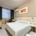 Jinjiang Inn Wuhan Wansongyuan Food Street Qushui Building guest room with double bed and desk in Wuhan