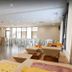 Bposhtels Orlando Disney in Kissimmee dining area with buffet trays, tables, and chairs