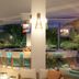 Margaritaville Beach Resort Grand Cayman in George Town with poolside lounge and tropical plants