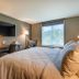 Four Points by Sheraton Brunswick room with king bed, desk, and window view