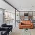Citi Hotel Residence Caruaru lobby seating area with leather sofas, glass tables and reception desk in Caruaru