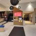 ibis Belfort Danjoutin lobby with reception desk, staircase and seating area in Danjoutin