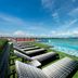 The Prestige Hotel Penang in George Town: rooftop infinity pool with lounge chairs and harbor views