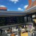 The Carrington Arms, Newport Pagnell: outdoor courtyard dining area with tables, chairs and open sky