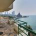 Garden Sea View Resort Pattaya balcony with ocean and city skyline views
