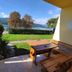 Pension zum Mühlrad in Millstatt with patio seating and lake and mountain views