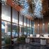 Haobo International Hotel in Wuxi lobby with tall glass walls and a sparkling chandelier ceiling