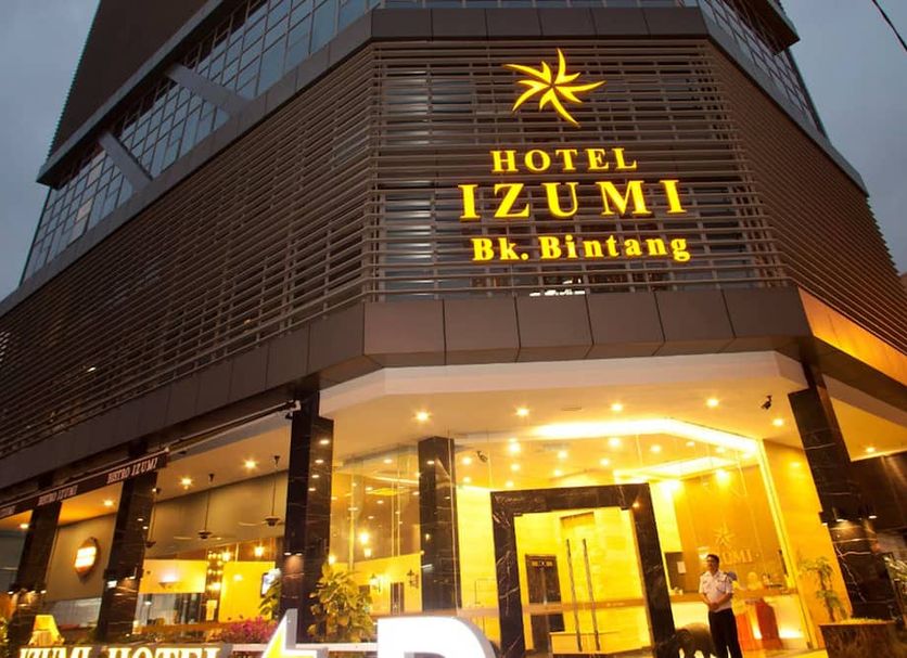 Izumi Hotel Bukit Bintang Kuala Lumpur exterior at night with illuminated entrance