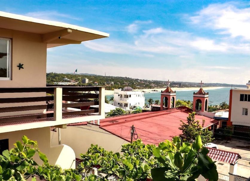 Hotel Rivera Del Mar in Puerto Escondido with balcony view over rooftops and the bay