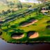 Lynnaya Urban River Resort in Siem Reap with a golf course and sand bunkers beside water