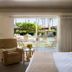 Desert Hills in Palm Springs guest room with patio access and pool view