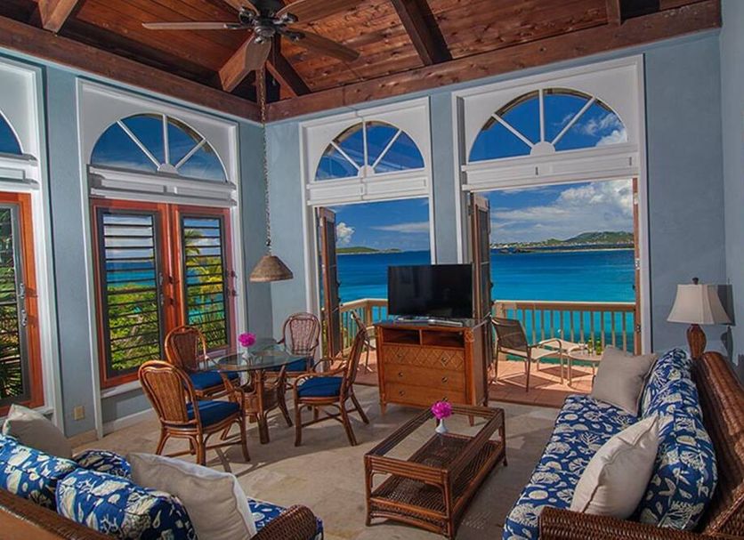 Suite St. John at Gallows Point Resort in St. John, ocean-view suite with arched windows and balcony