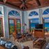 Suite St. John at Gallows Point Resort in St. John, ocean-view suite with arched windows and balcony