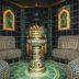 Gut Lauterbad Hotel in Freudenstadt: ornate tiled sauna with central heater and bench seating