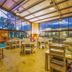 Sunrock Guesthouse in Kempton Park dining area with ping pong table and large glass windows