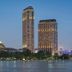 Hyatt Regency Creek Heights Residences in Dubai skyline view at dusk with creekside towers and Burj Khalifa