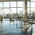 Sheraton Eatontown Hotel in Eatontown event space with round floral arch and sunlight through windows