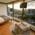 Viewtower Resort in Jeju City room with floor-to-ceiling windows and ocean view