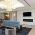 La Quinta Inn & Suites by Wyndham Bakersfield North lobby with seating area and fireplace in Bakersfield