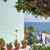Sea Breeze Apartments Chios in Agios Emilianos with sea view, terrace gate, and potted plants