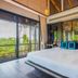 Baba Beach Club Natai Luxury Pool Villa Hotel by Sri panwa bedroom with balcony and garden view in Takua Thung