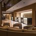 The Lincoln Marriott Cornhusker Hotel lobby with curved seating, front desk, and mezzanine in Lincoln