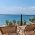 Rosy Suites Hotel in Kusadasi terrace with loungers overlooking the sea and beach