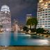 Grande Centre Point Terminal 21 Bangkok rooftop infinity pool with city skyline at night