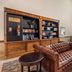Best Western La Grange Inn & Suites lobby with leather sofa, bookshelves and seating area in La Grange