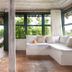Pousada Outeiro in Trancoso, airy room with daybed seating and hammock-view terrace