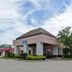 Heritage Inn & Suites by Capital O Baton Rouge I 10 exterior with peaked roof and parking lot