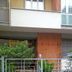 Bb Dolce Luna in Florence entrance with gated patio, benches and potted greenery