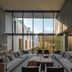 Hotel Arima & Spa lounge in San Sebastian with floor-to-ceiling windows and forest views