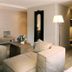 Bad Bubendorf Design & Lifestyle Hotel room with sofa, desk, table lamp and floor lamp in Bubendorf