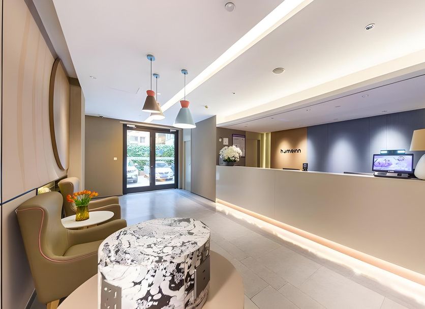 Home Inn Neo Lanzhou City Museum Dongfanghong Plaza Wanxiang City lobby with reception desk and seating