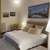 Coco Places Soggiorno Panerai in Florence, cozy guest room with double bed and city-view window
