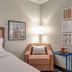 Hampton Inn Washington Court House Area room with bed, armchair, floor lamp and wall art in Jeffersonville